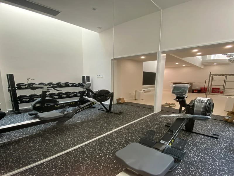 Gym flooring installation failure examples showing gaps and bubbles vs professional results